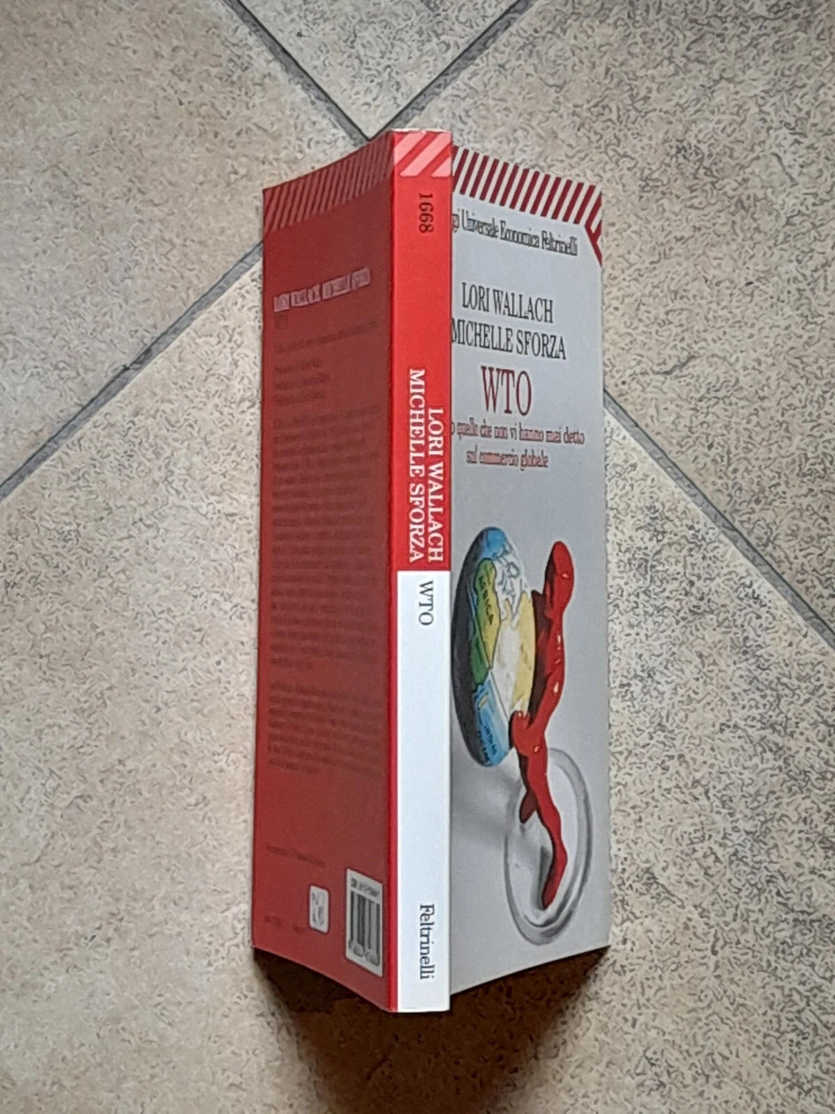WTO. TUTTO QUELLO CHE NON VI HANNO MAI DETTO SUL COMMERCIO GLOBALE. LORI WALLACH - MICHELLE SFORZA. FELTRINELLI EDITORE. COLLANA: SAGGI UNIVERSALE ECONOMICA FELTRINELLI. 1° EDIZIONE NELL'"UNIVERSALE ECONOMICA" - SAGGI MAGGIO 2001.