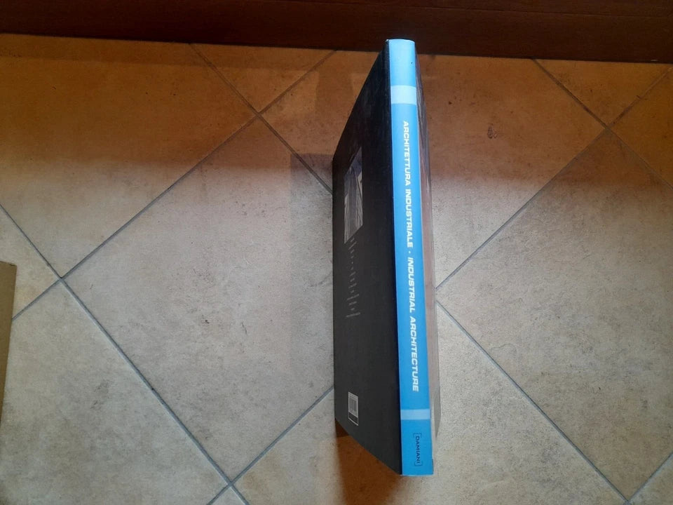 ARCHITETTURA INDUSTRIALE. GLAUCO GRESLERI - ENZO ZACCHIROLI. DAMIANI EDITORE, 2004. BILINGUE: ITALIANO - INGLESE.