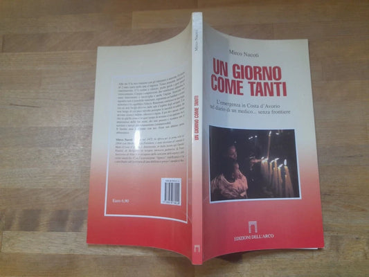 UN GIORNO COME TANTI. MIRCO NACOTI. EDIZIONI DELL'ARCO. L'EMERGENZA IN COSTA D'AVORIO. 1° EDIZIONE 2005. COLLANA: DENTRO E FUORI.
