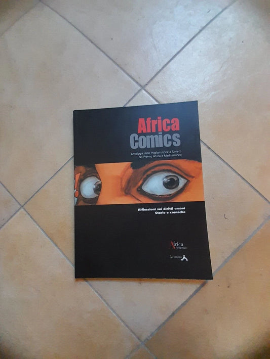 AFRICA COMICS. ANTOLOGIA DELLE MIGLIORI STORIE A FUMETTI DEL PREMIO AFRICA. AA.VV. LAI - MOMO 2002.