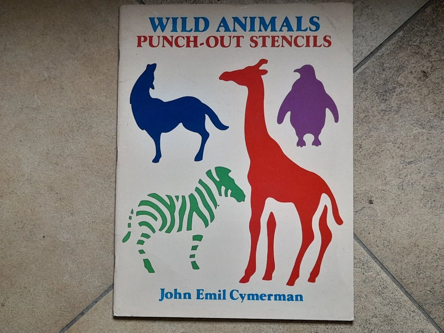 WILD ANIMALS PUNCH-OUT STENCILS. J. E. CYMERMAN. DOVER PUBLICATIONS, INC., NEW YORK. 1° EDIZIONE INGLESE 1994.