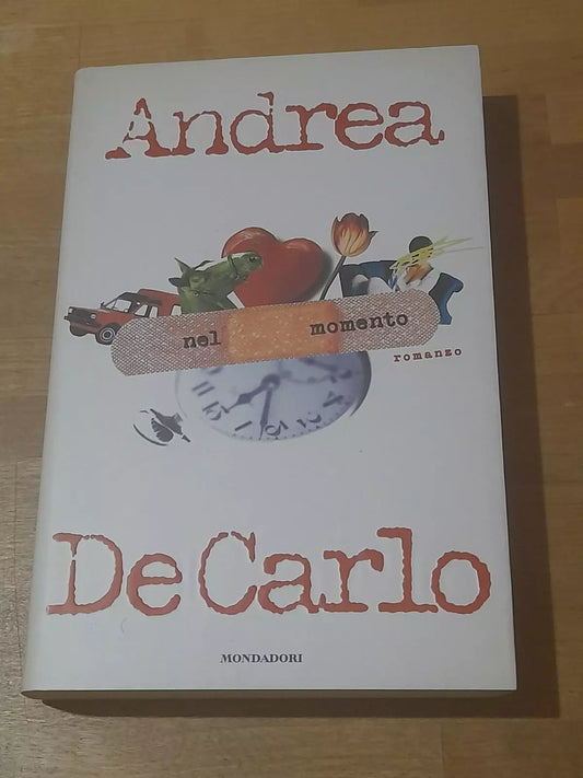 NEL MOMENTO. ANDREA DE CARLO. MONDADORI EDITORE. COLLANA: SCRITTORI ITALIANI. 1° EDIZIONE OTTOBRE 1999.