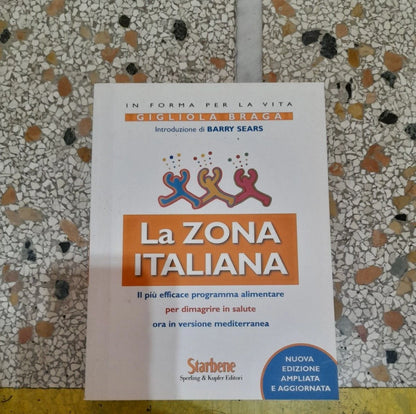 LA ZONA ITALIANA. GIGLIOLA BRAGA. NUOVA EDIZIONE AMPLIATA E AGGIORNATA. SPERLING & KUPFER EDITORI. RISTAMPA 2007.