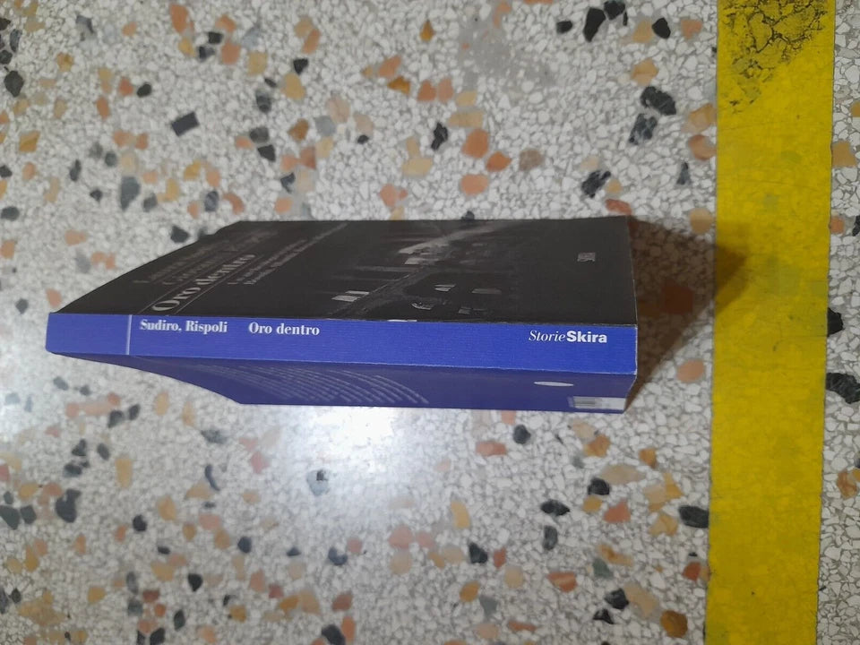 ORO DENTRO. UN ARCHEOLOGO IN TRINCEA. LAURA SUDIRO - GIOVANNI RISPOLI. SKIRA EDITORE. RISTAMPA 2015. COLLANA: STORIESKIRA.