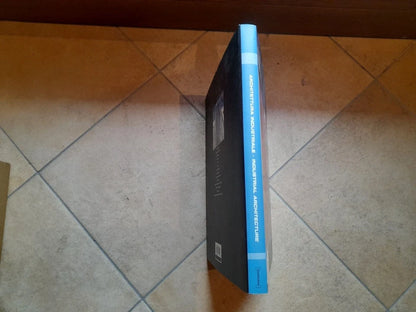 ARCHITETTURA INDUSTRIALE. GLAUCO GRESLERI - ENZO ZACCHIROLI. DAMIANI EDITORE, 2004. BILINGUE: ITALIANO - INGLESE.