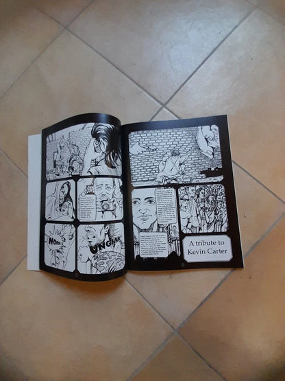 AFRICA COMICS. ANTOLOGIA DELLE MIGLIORI STORIE A FUMETTI DEL PREMIO AFRICA. AA.VV. LAI - MOMO 2002.