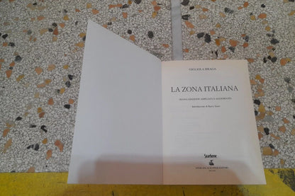 LA ZONA ITALIANA. GIGLIOLA BRAGA. NUOVA EDIZIONE AMPLIATA E AGGIORNATA. SPERLING & KUPFER EDITORI. RISTAMPA 2007.