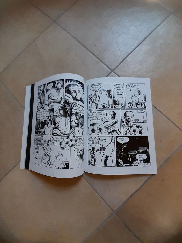AFRICA COMICS. ANTOLOGIA DELLE MIGLIORI STORIE A FUMETTI DEL PREMIO AFRICA. AA.VV. LAI - MOMO 2002.