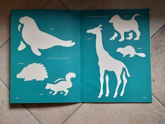 WILD ANIMALS PUNCH-OUT STENCILS. J. E. CYMERMAN. DOVER PUBLICATIONS, INC., NEW YORK. 1° EDIZIONE INGLESE 1994.