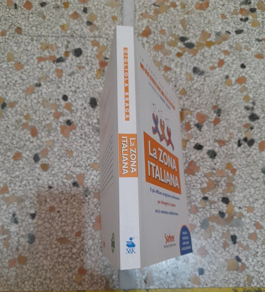 LA ZONA ITALIANA. GIGLIOLA BRAGA. NUOVA EDIZIONE AMPLIATA E AGGIORNATA. SPERLING & KUPFER EDITORI. RISTAMPA 2007.