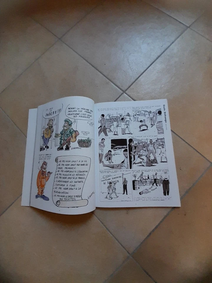 AFRICA COMICS. ANTOLOGIA DELLE MIGLIORI STORIE A FUMETTI DEL PREMIO AFRICA. AA.VV. LAI - MOMO 2002.