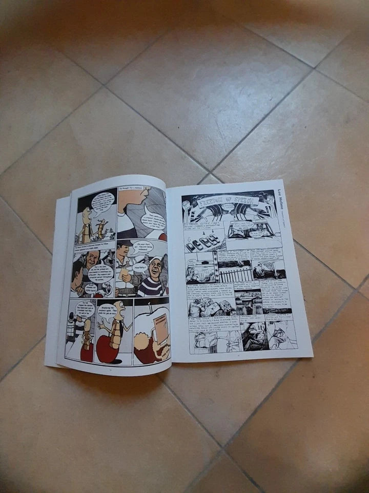 AFRICA COMICS. ANTOLOGIA DELLE MIGLIORI STORIE A FUMETTI DEL PREMIO AFRICA. AA.VV. LAI - MOMO 2002.