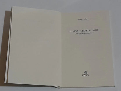 IL VISO NERO STELLATO. RACCONTI DI MIGRANTI. ALBERTO MERINI. CLUEB EDITRICE. 1° EDIZIONE 2025.