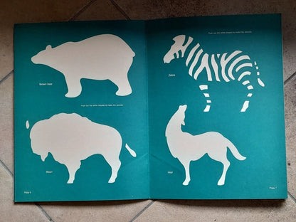WILD ANIMALS PUNCH-OUT STENCILS. J. E. CYMERMAN. DOVER PUBLICATIONS, INC., NEW YORK. 1° EDIZIONE INGLESE 1994.